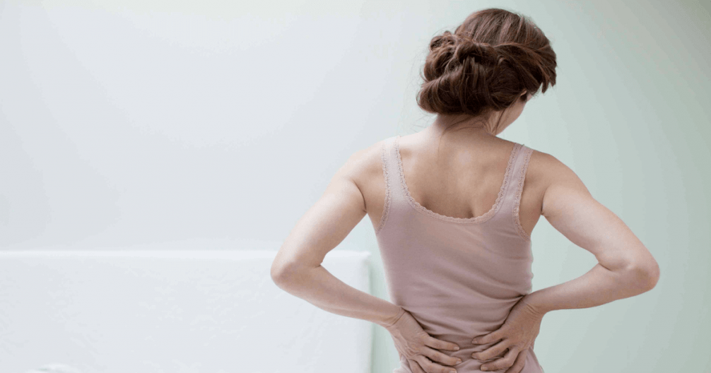 Bolesť chrbta u ženy